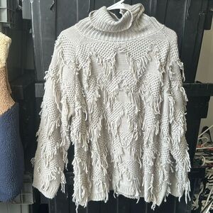 New cowl neck fringe sweater